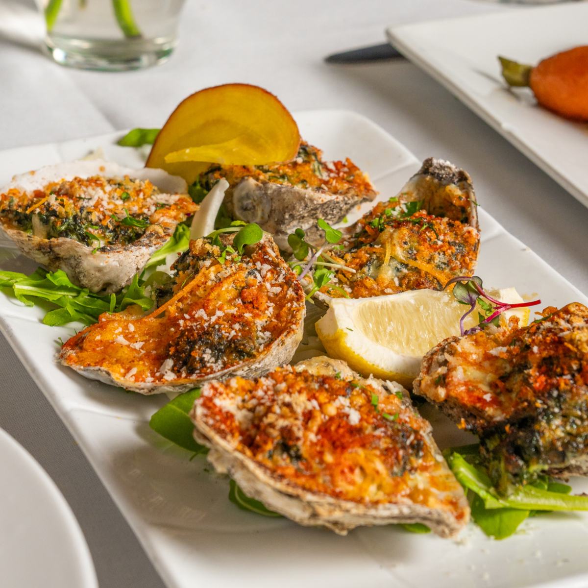 Oysters Rockefeller with lemon